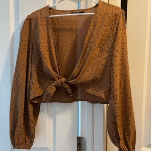 Brown star and lightening v neck blouse